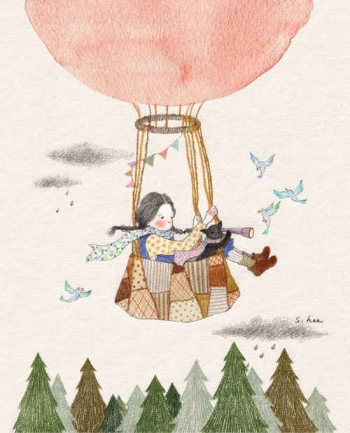 девочка и кот летают на воздушном шаре